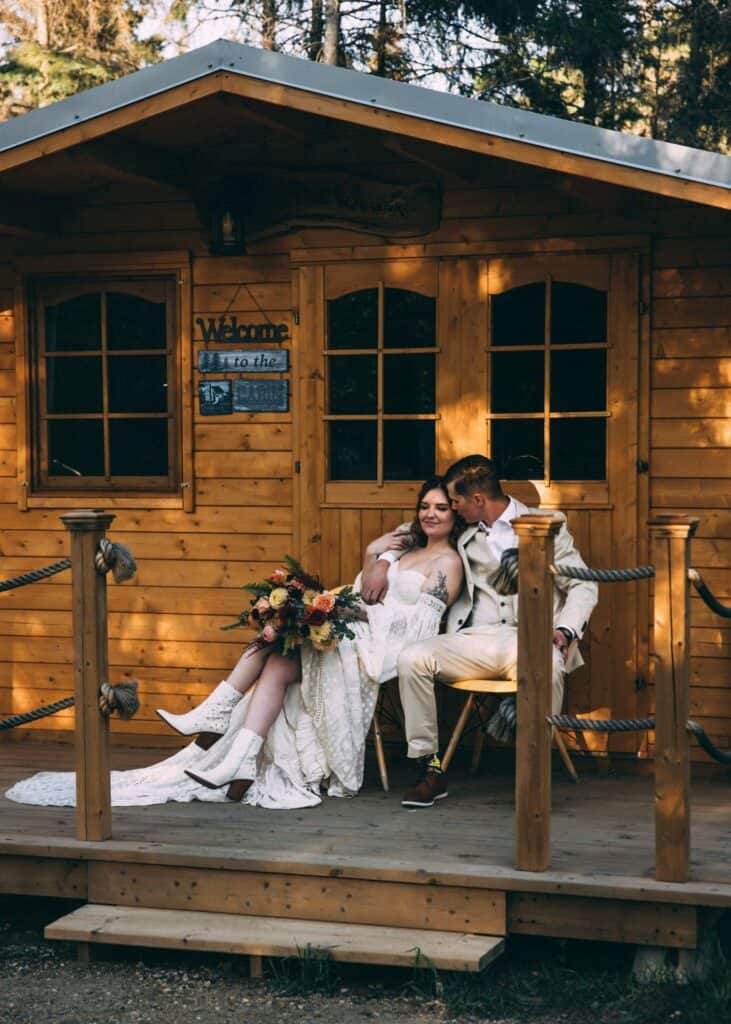couple eloping at elk island retreat cabin