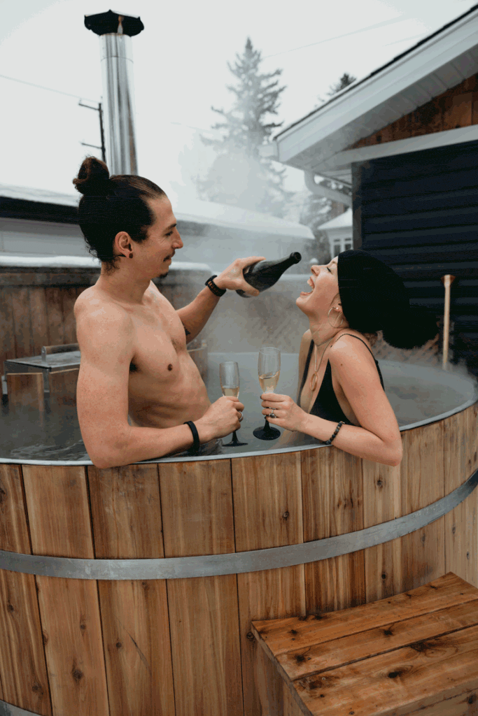 couple enjoying the hot tub on their elopement day