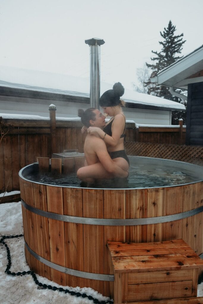 couple enjoying the hot tub on their elopement day