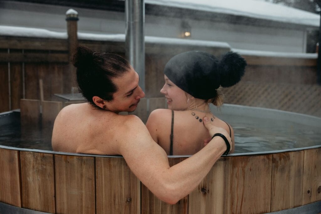 couple enjoying the hot tub on their elopement day