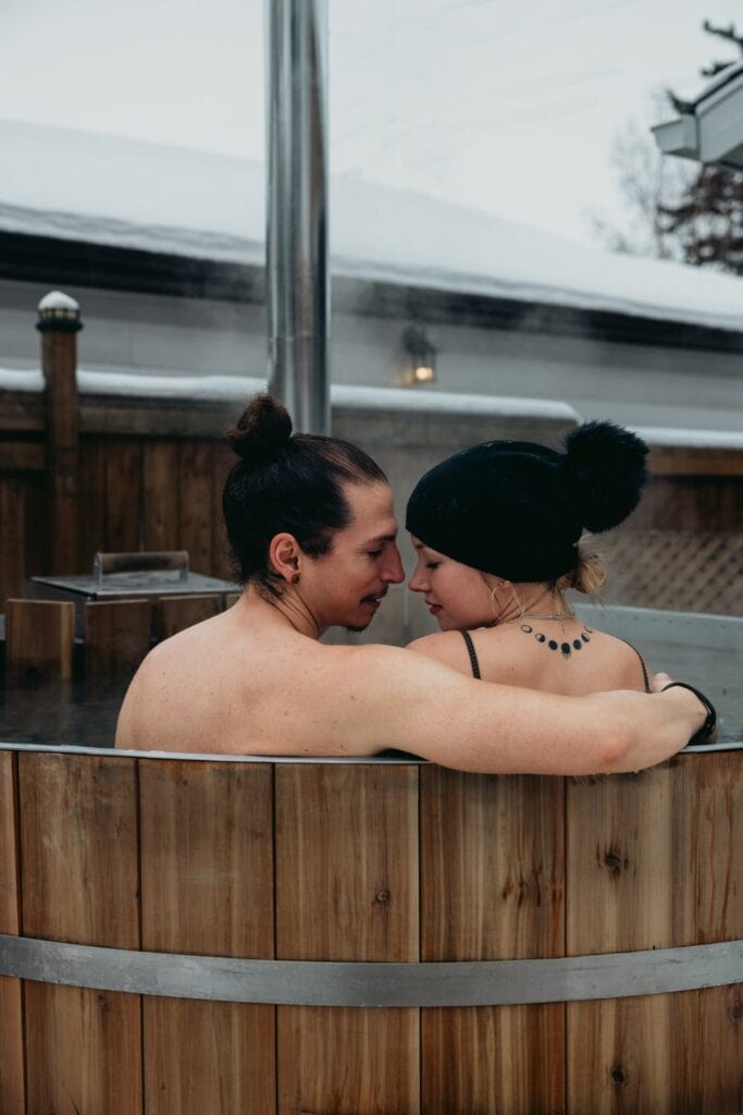 couple enjoying the hot tub on their elopement day