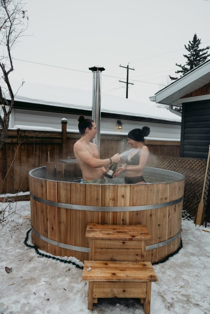 couple enjoying the hot tub on their elopement day