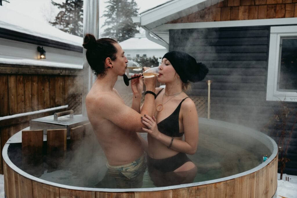 couple enjoying the hot tub on their elopement day