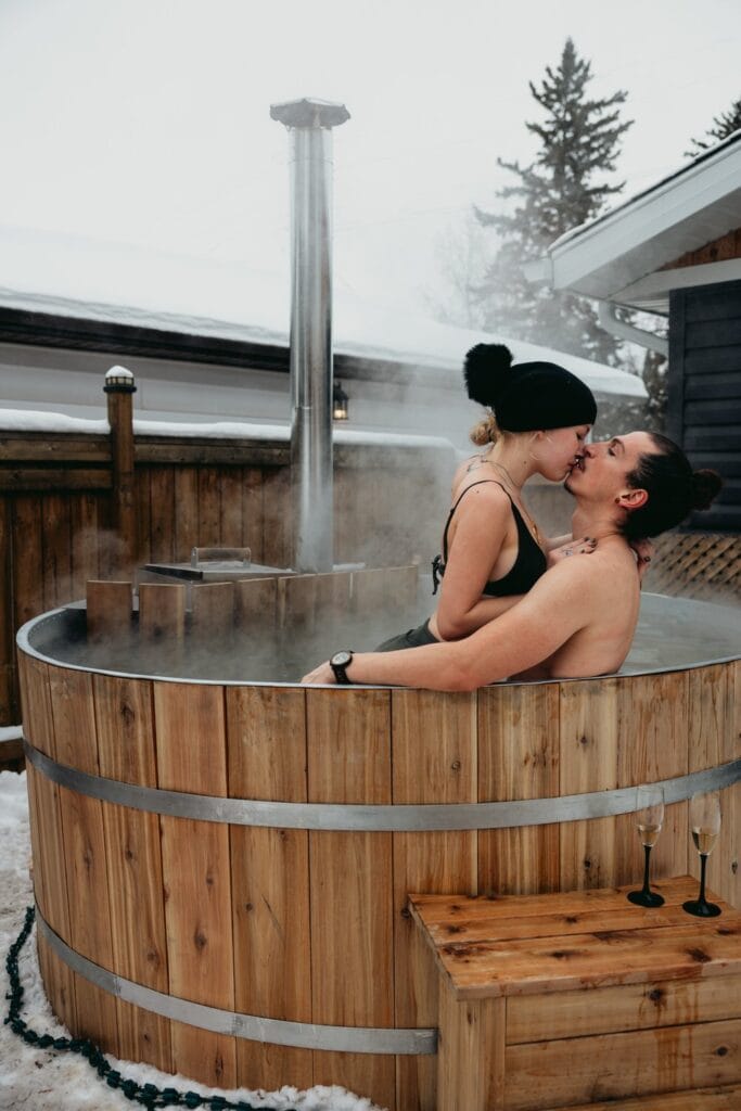 couple enjoying the hot tub on their elopement day