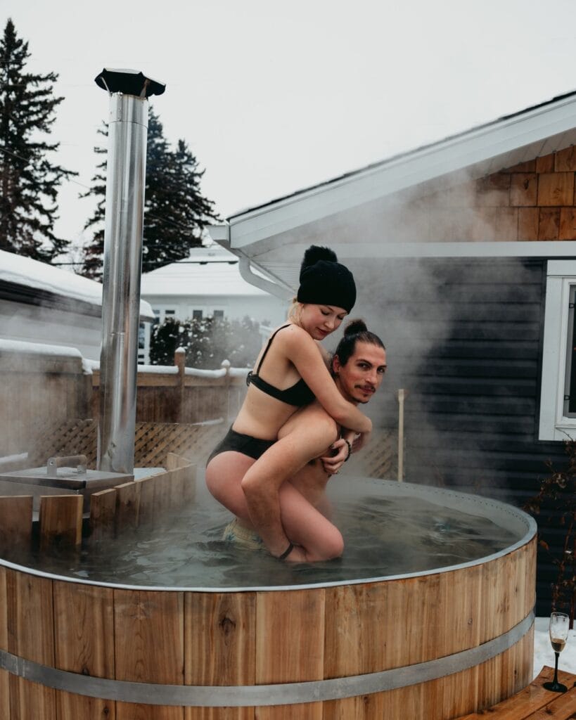 couple enjoying the hot tub on their elopement day