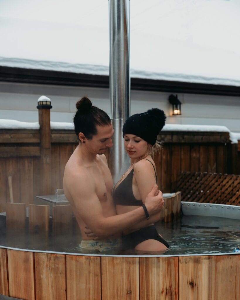 couple enjoying the hot tub on their elopement day