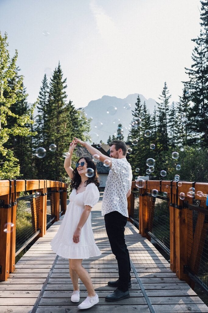 fun elopement ideas - dancing under bubbles