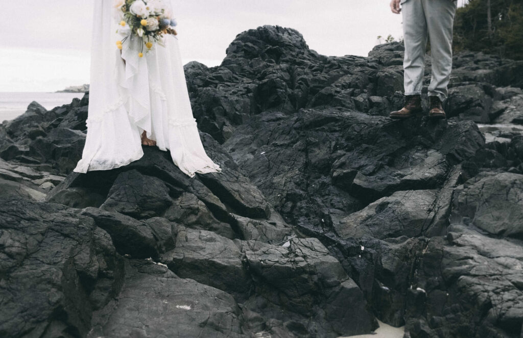 eloping in british columbia-  couple  on the beach in tofino