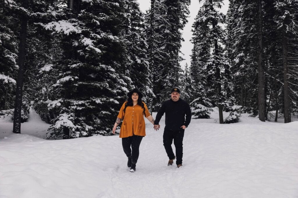 couple walking through the forrest