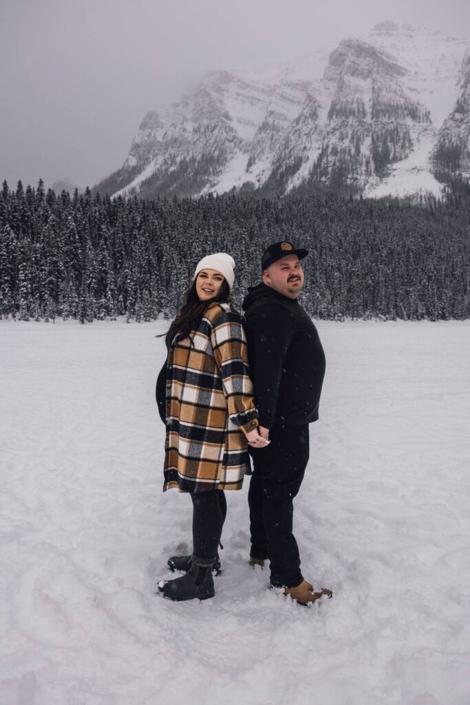 couple enjoying the snow at lake louise