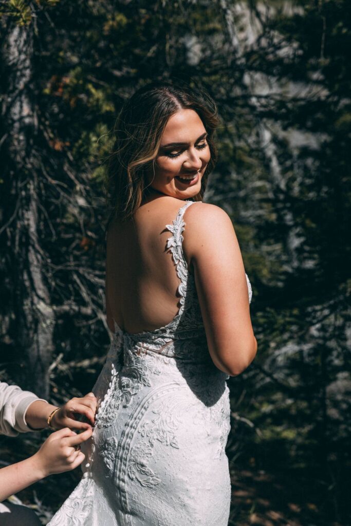 bride getting ready in the forest