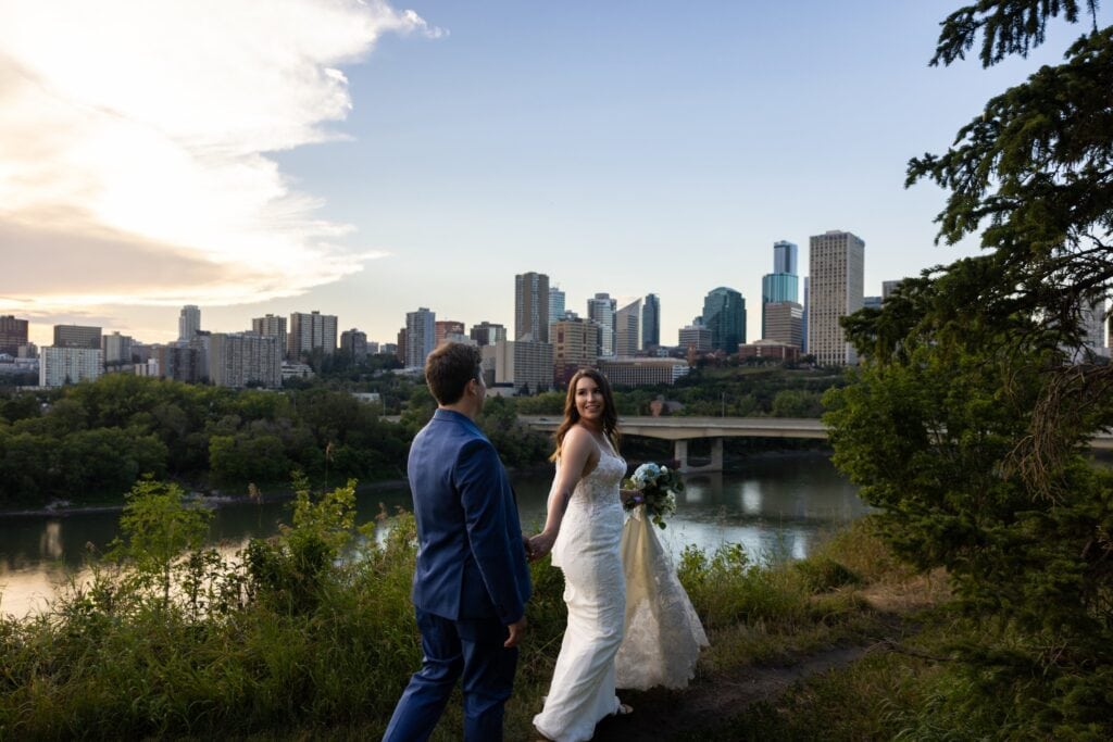 views of edmonton cityscape with eloping couple