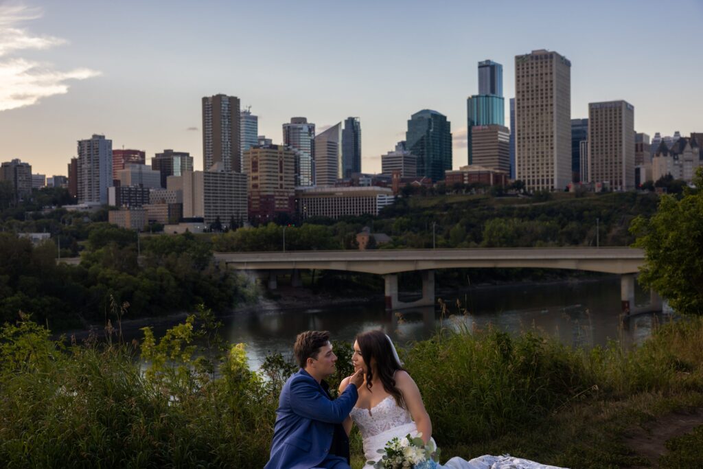 couple portraits with edmonton cityscape 