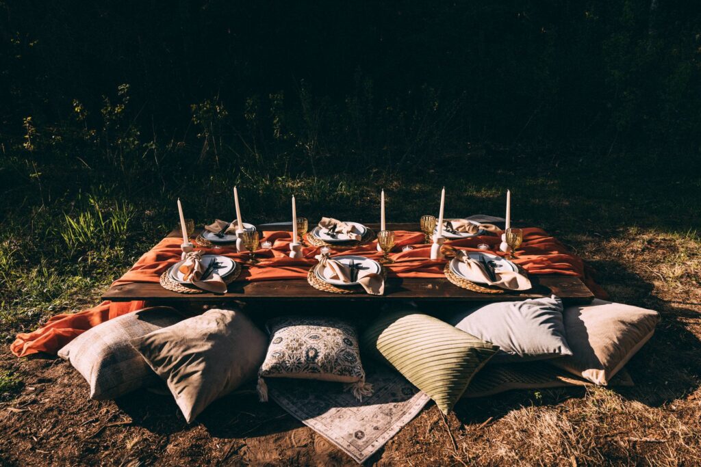 couple eloping at elk island retreat picnic set