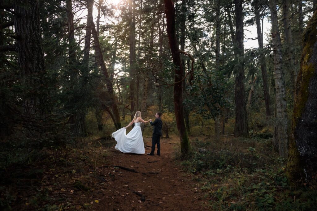 wedding couple dancing in the forest