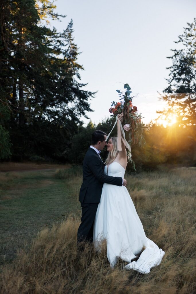 wedding elopement couple cheering on vancouver island