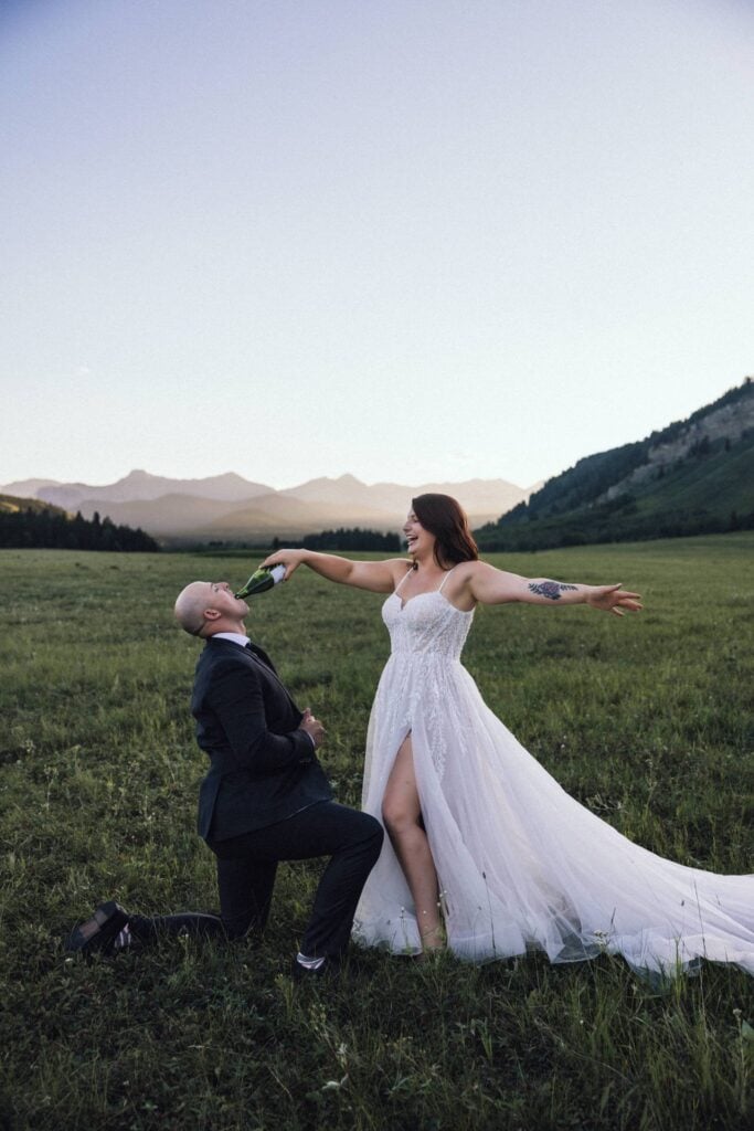wedding couple popping champagne photos