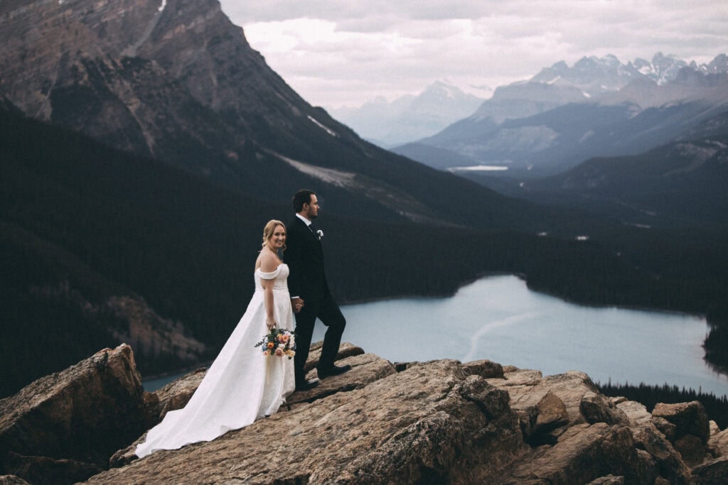 couple eloping at sunrise at peyto lake in banff national park