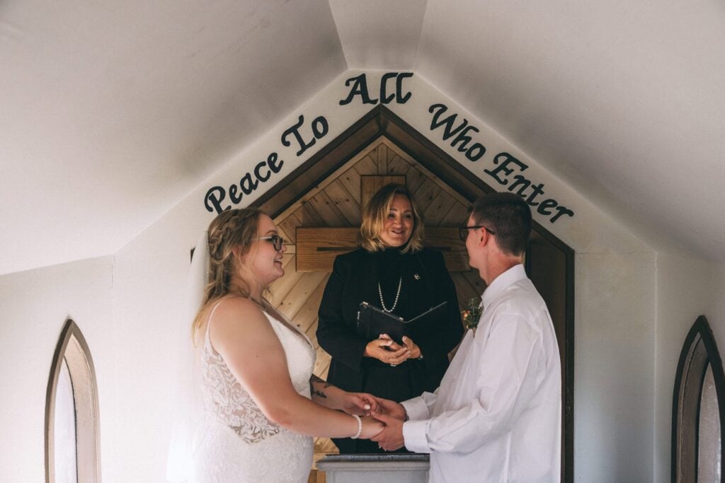 Elopement ceremony at The Little Church in Drumheller