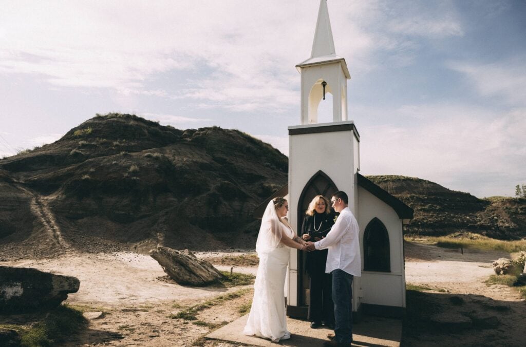Elopement ceremony at The Little Church in Drumheller
