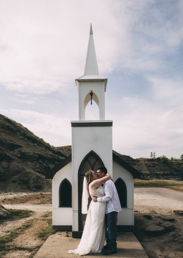 Elopement ceremony at The Little Church in Drumheller