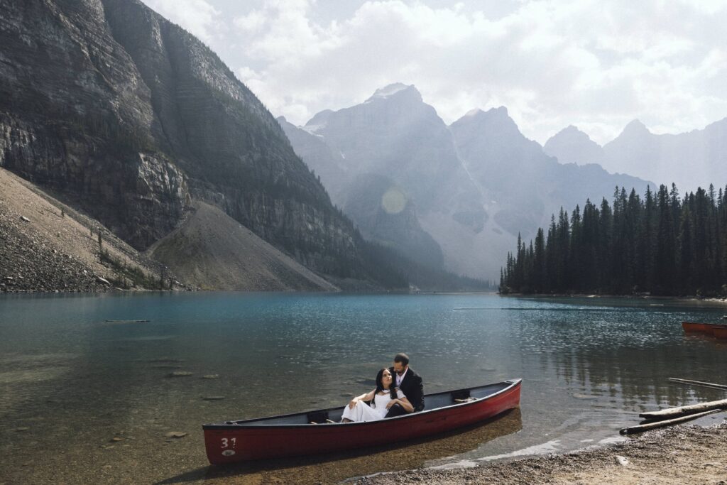 outdoor elopement ideas - canoe ride at maligne lake