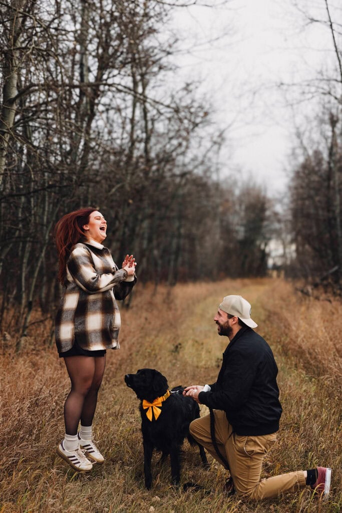 excited reaction of girl during proposal while she jumps with joy